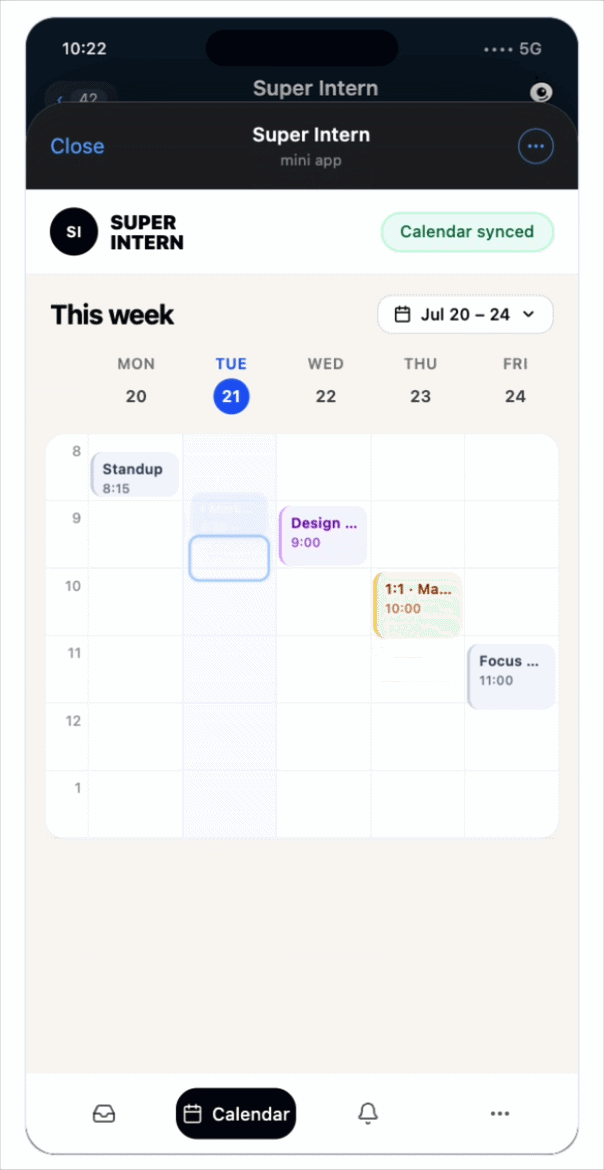 Booked by voice: the event lands in the week, invites go out, and it says so — “added to Tue 9:30 AM · 4 invites sent”.